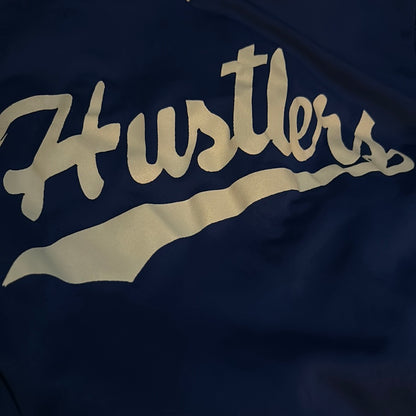 Hustlers 70’s V Neck Team Shirt